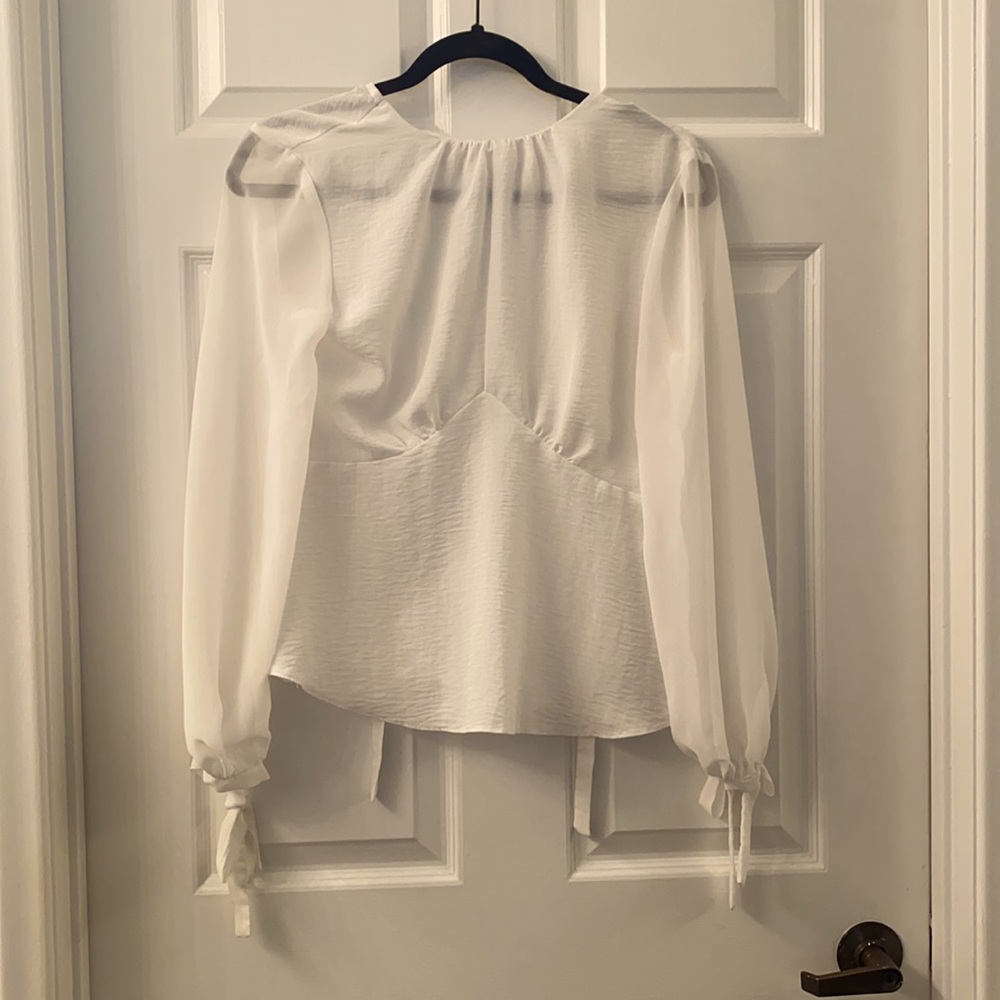 White chiffon blouse with keyhole back and bow
